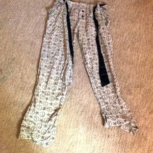 Tarea pajama pants. Has stars and peace signs